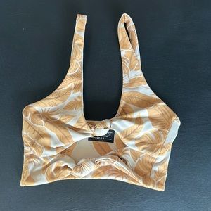 Size S Beach Riot tan palm sports bra.